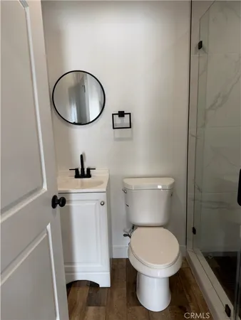 a bathroom with a toilet and a sink