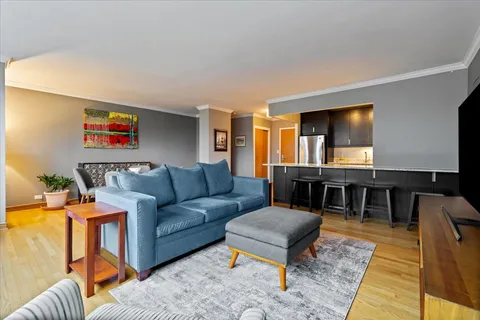 a living room with furniture and a table