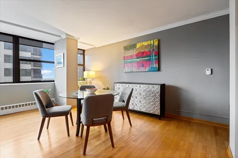 a view of a livingroom with furniture and wooden floor