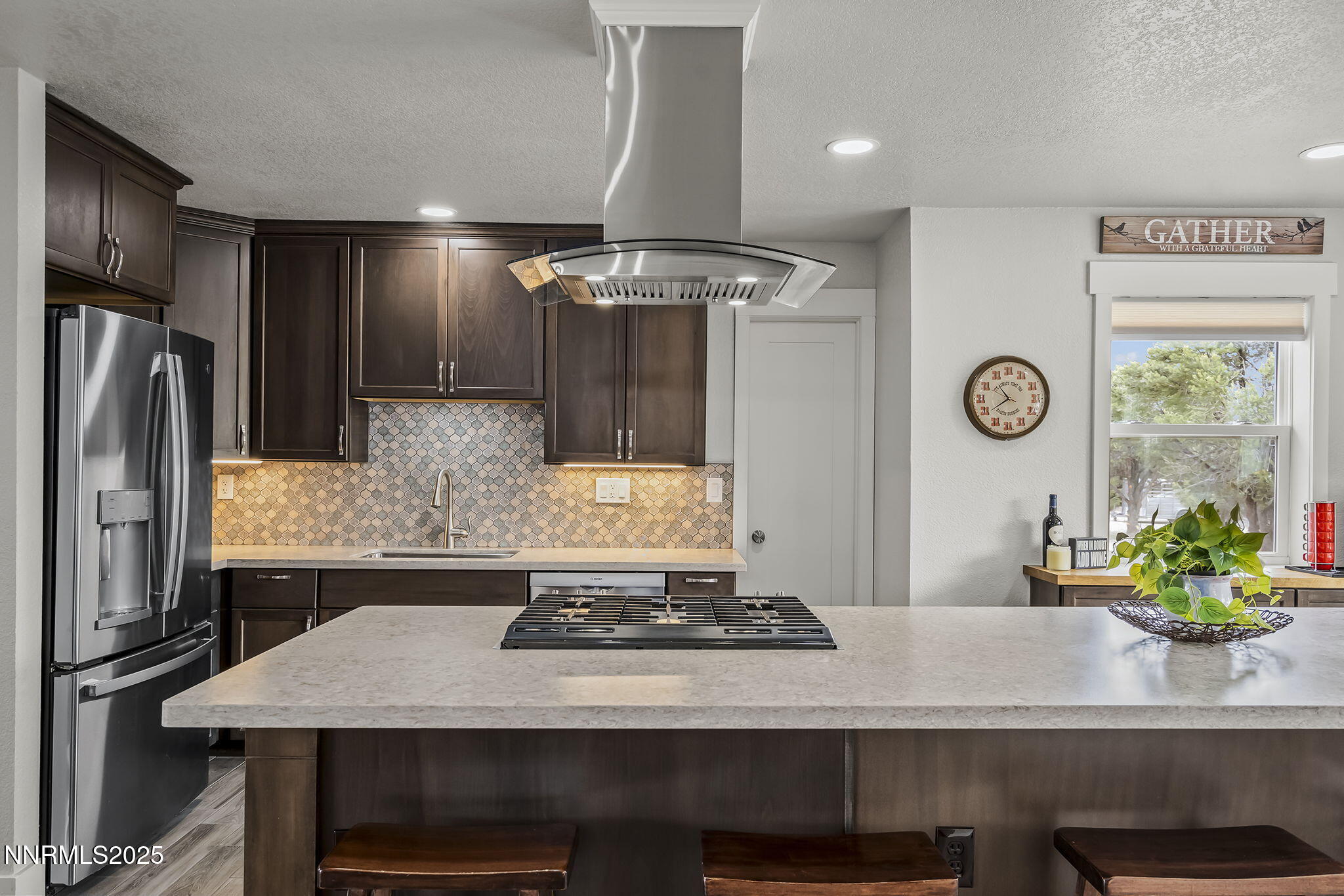 4970 Dry Gulch Road Reno, NV 89521 - Photo 22 of 44 a kitchen with a table and chairs in it