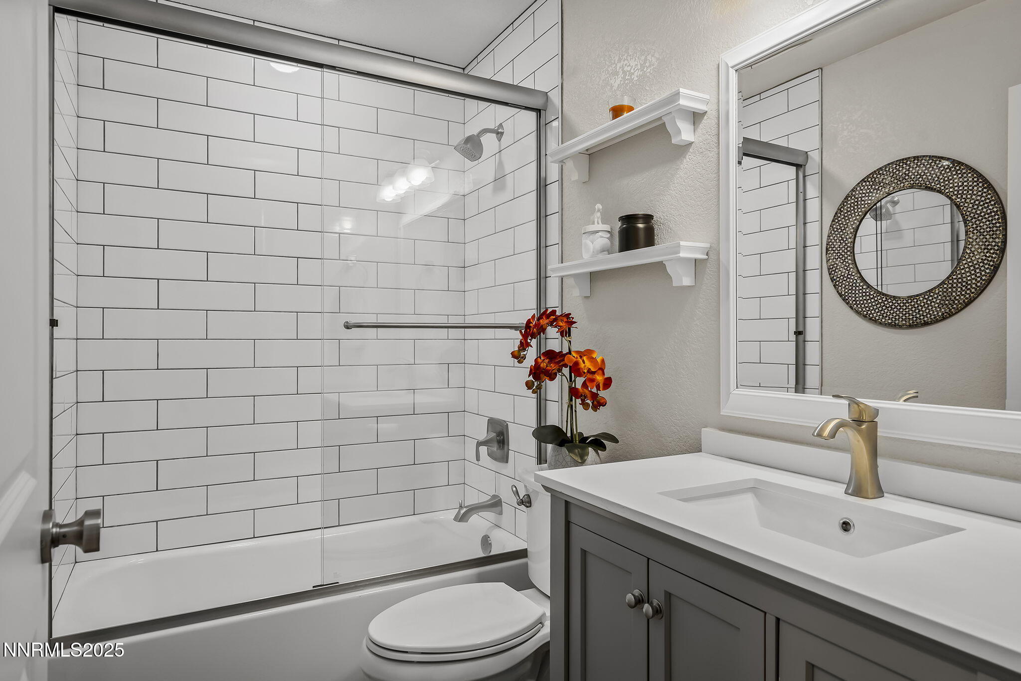 4970 Dry Gulch Road Reno, NV 89521 - Photo 30 of 44 a bathroom with a sink a toilet and shower