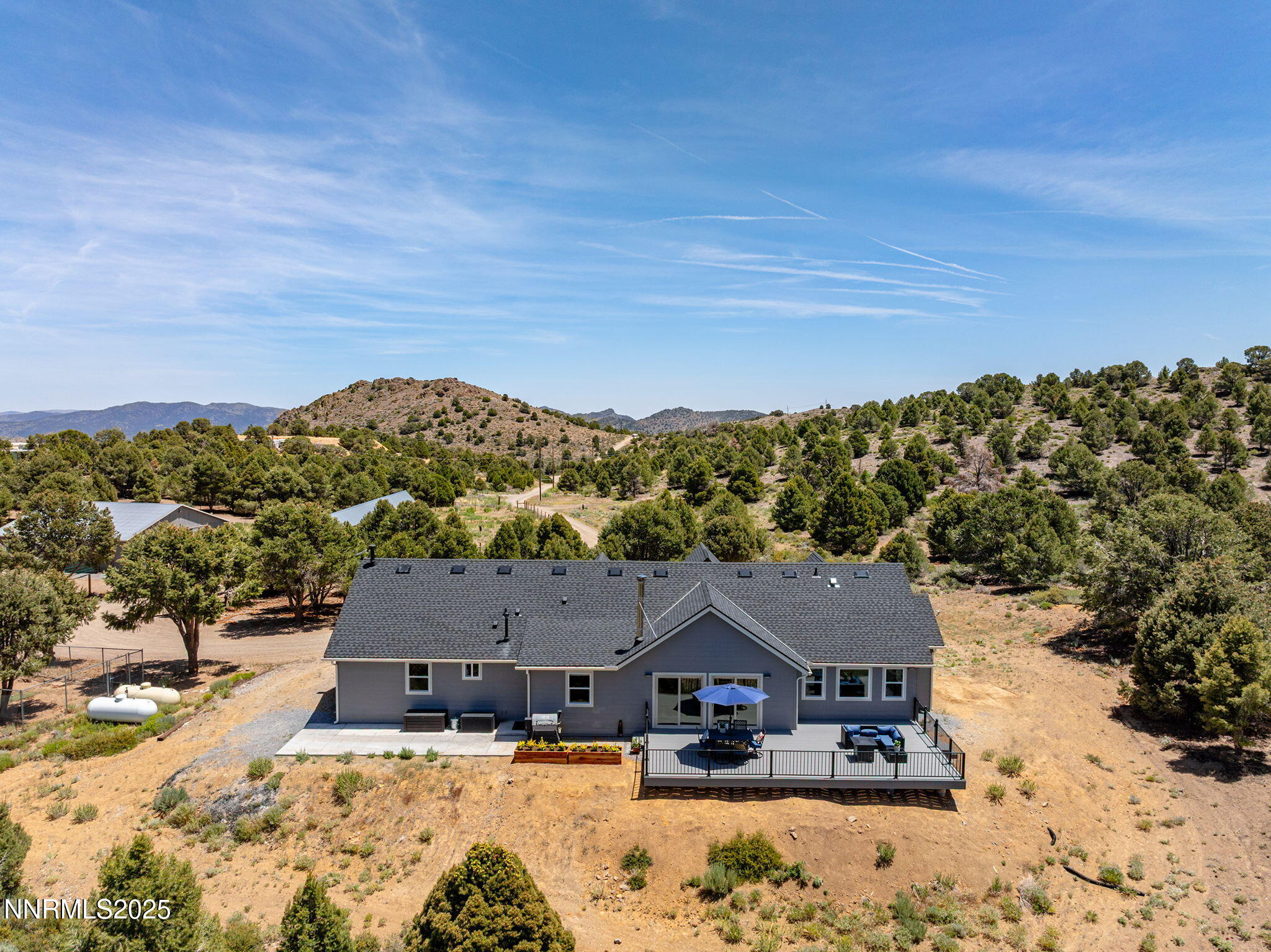 4970 Dry Gulch Road Reno, NV 89521 - Photo 35 of 44 a view of house with yard