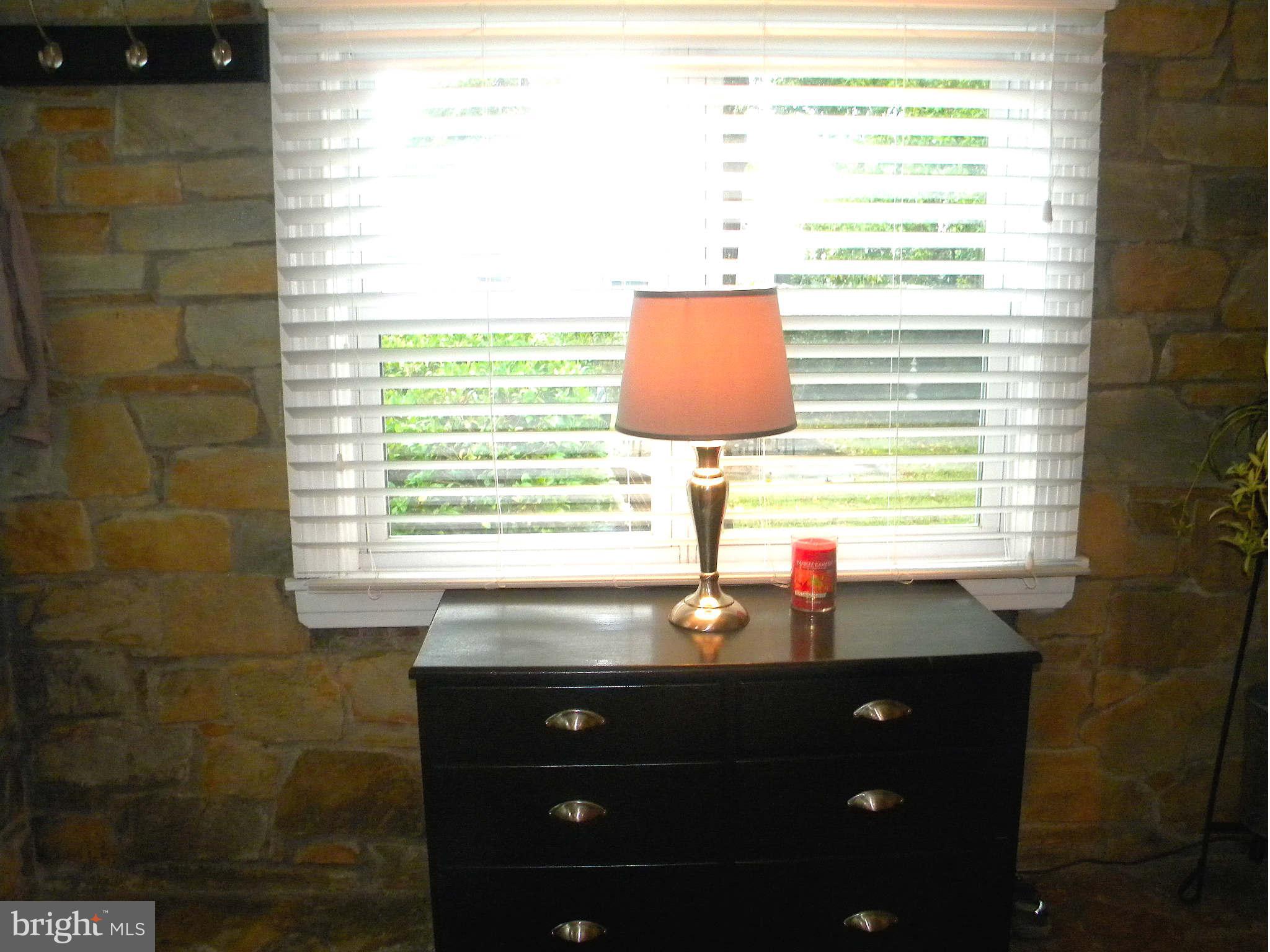 420 Cedar Grove Road Edgewater, MD 21037 - Photo 3 of 27 a room with a window and a sink