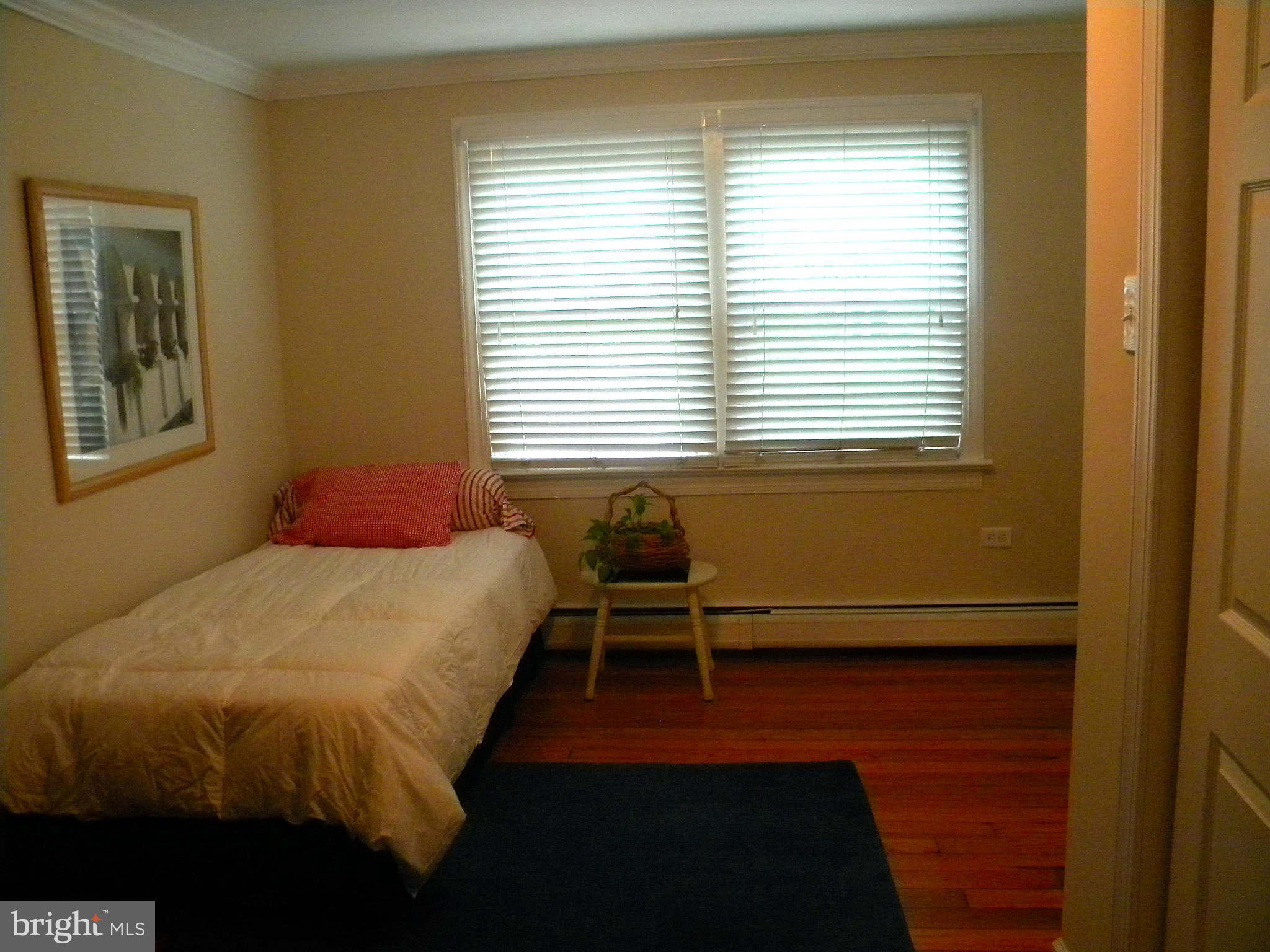 420 Cedar Grove Road Edgewater, MD 21037 - Photo 22 of 27 a bedroom with a bed and a window