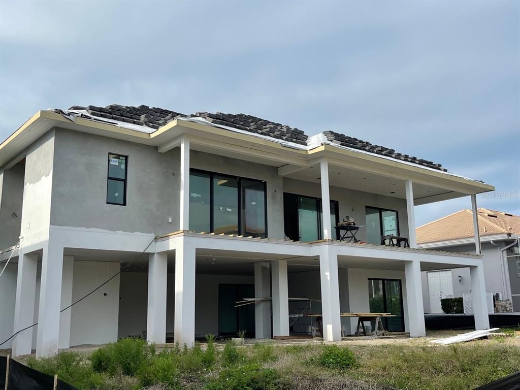12619 Safe Harbour Drive Cortez, FL 34215 - Photo 1 of 21 a front view of a house