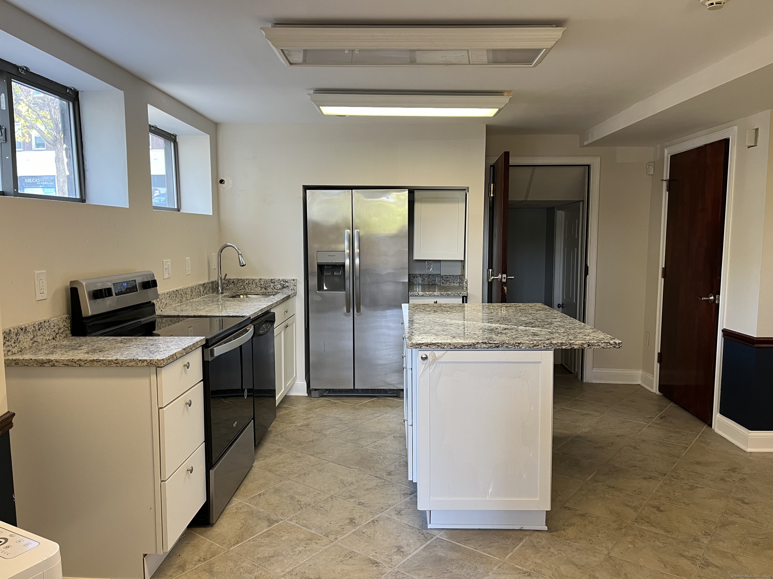 1397-1399 State Street, Unit 6 New Haven, CT 06511 - Photo 1 of 13 a kitchen with a sink stove and refrigerator