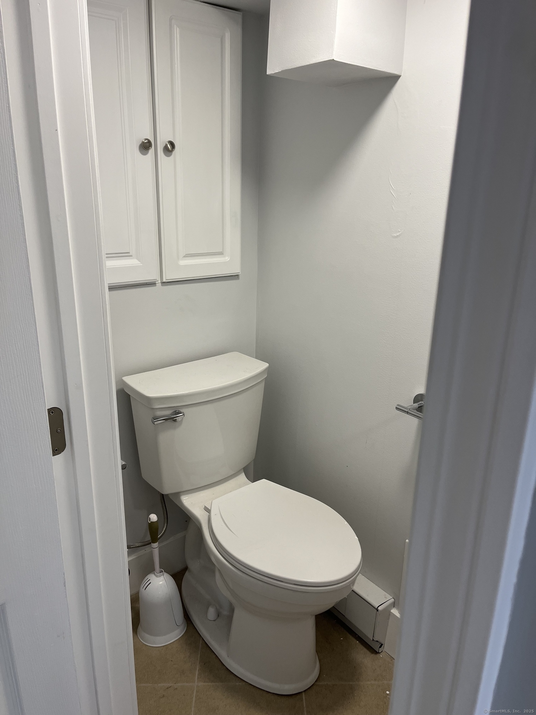 1397-1399 State Street, Unit 6 New Haven, CT 06511 - Photo 8 of 13 a white toilet sitting next to a sink