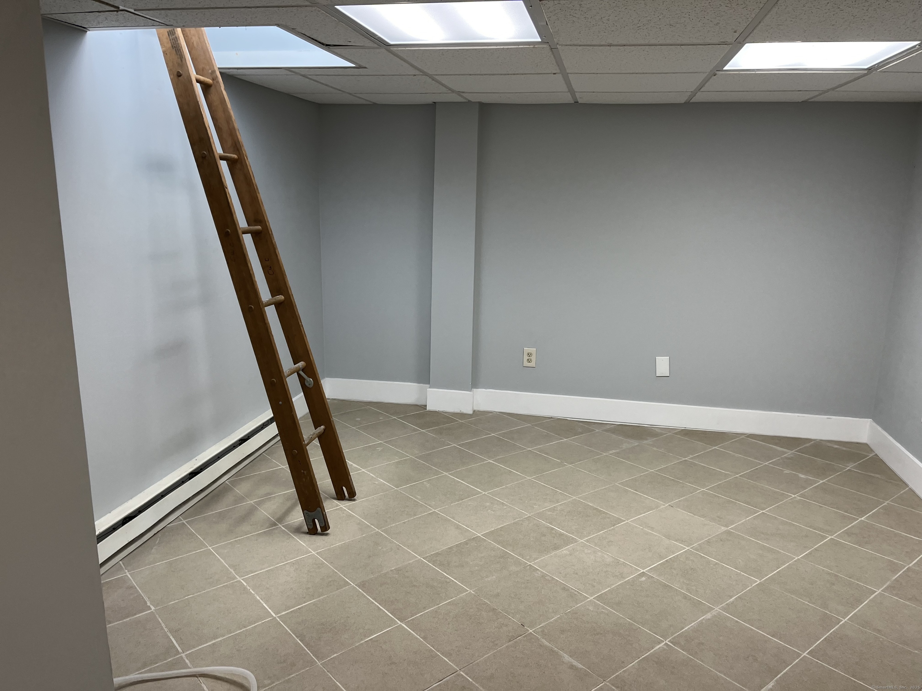 1397-1399 State Street, Unit 6 New Haven, CT 06511 - Photo 10 of 13 a view of a room with rack and white walls