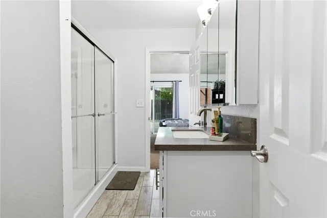 a bathroom with a sink and a mirror