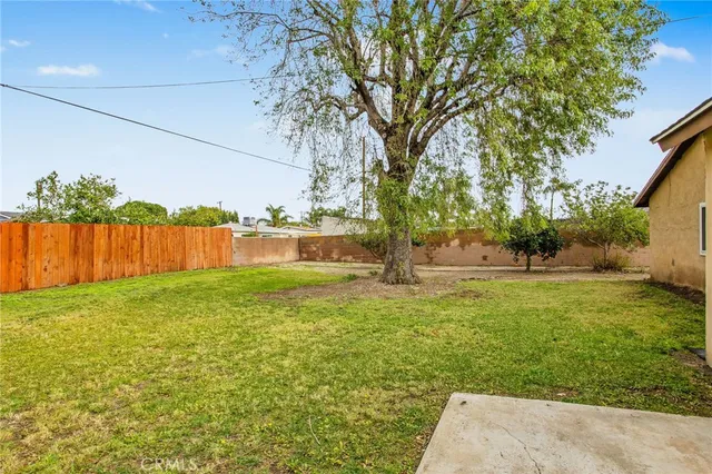 a view of backyard with green space