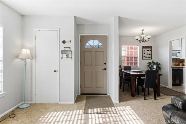 a view of a livingroom with furniture and window