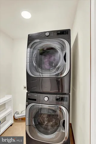 a view of an empty room and wooden floor