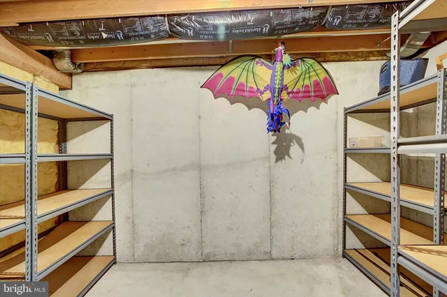 a view of a house with wooden floor and iron stairs