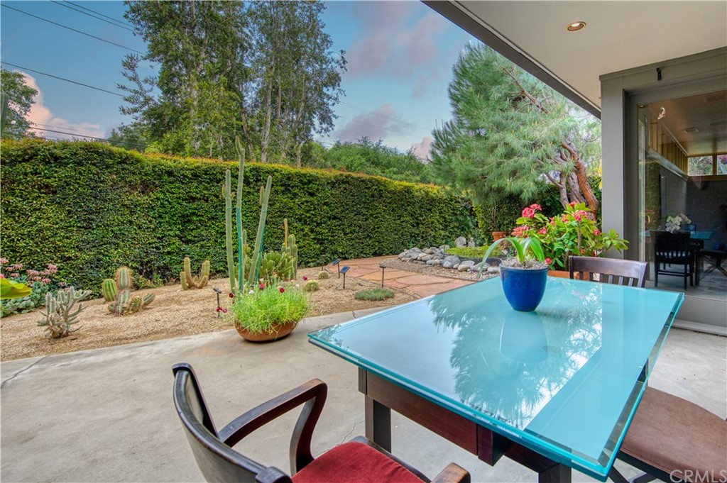 600 Chaparral Road Sierra Madre, CA 91024 - Photo 11 of 25 a view of a dining room with furniture window and outside view