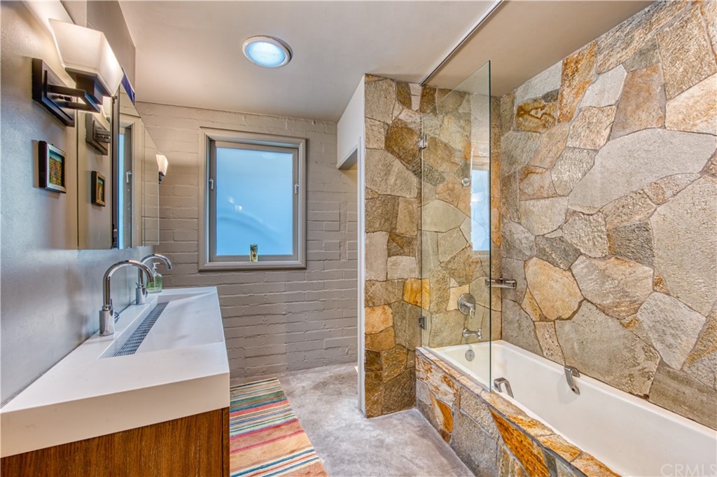 600 Chaparral Road Sierra Madre, CA 91024 - Photo 18 of 25 a bathroom with a bathtub and a sink
