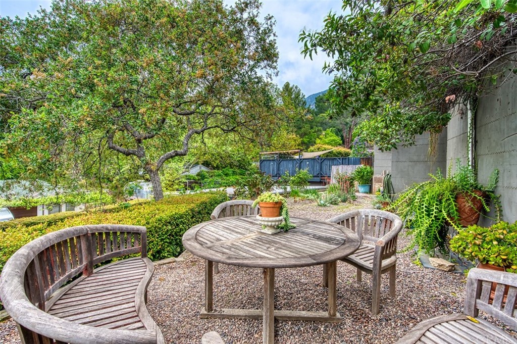 600 Chaparral Road Sierra Madre, CA 91024 - Photo 21 of 25 a view of a table and chairs in patio