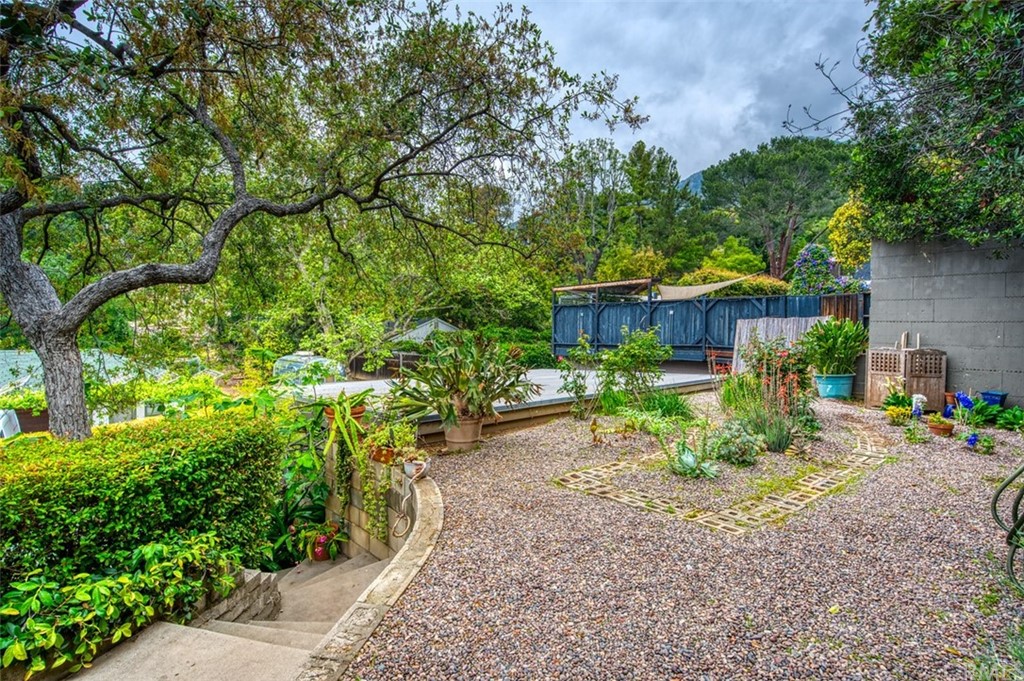 600 Chaparral Road Sierra Madre, CA 91024 - Photo 22 of 25 a front view of a house with garden
