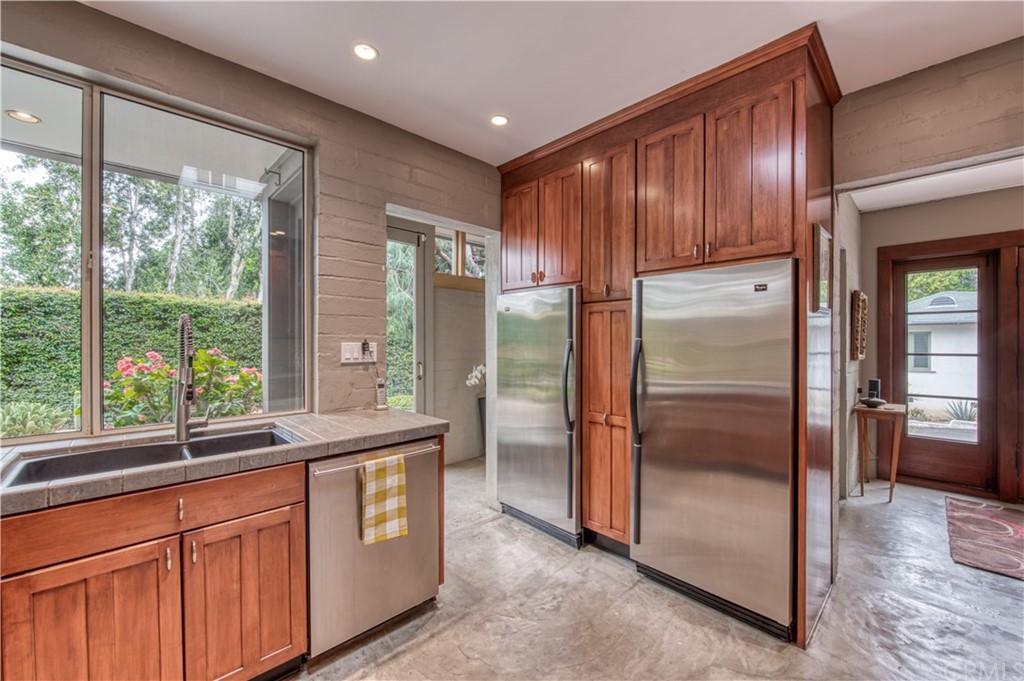 600 Chaparral Road Sierra Madre, CA 91024 - Photo 10 of 25 a kitchen with stainless steel appliances granite countertop a refrigerator and a sink
