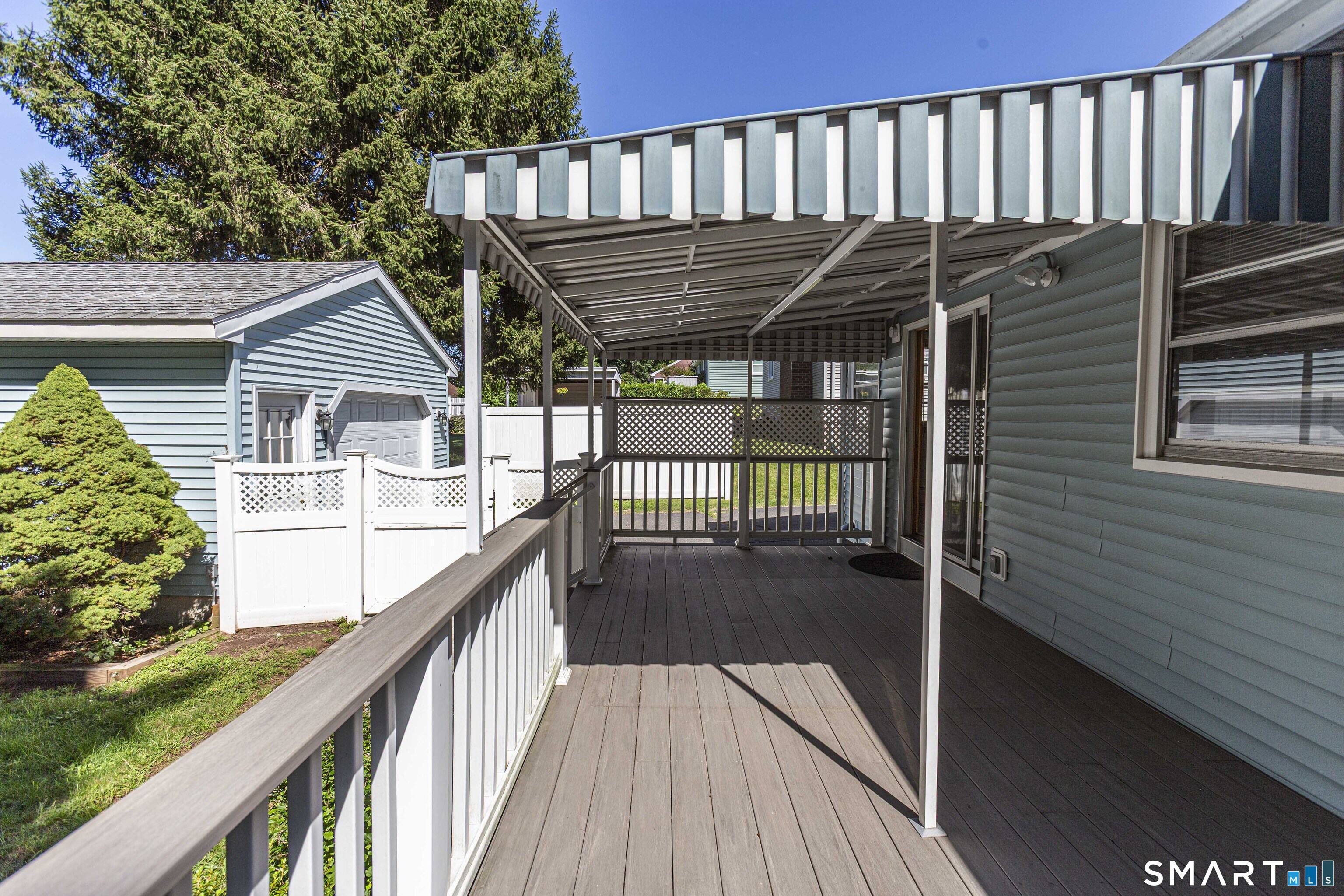 16 Philip Road Manchester, CT 06040 - Photo 20 of 23 Deck that is partially covered