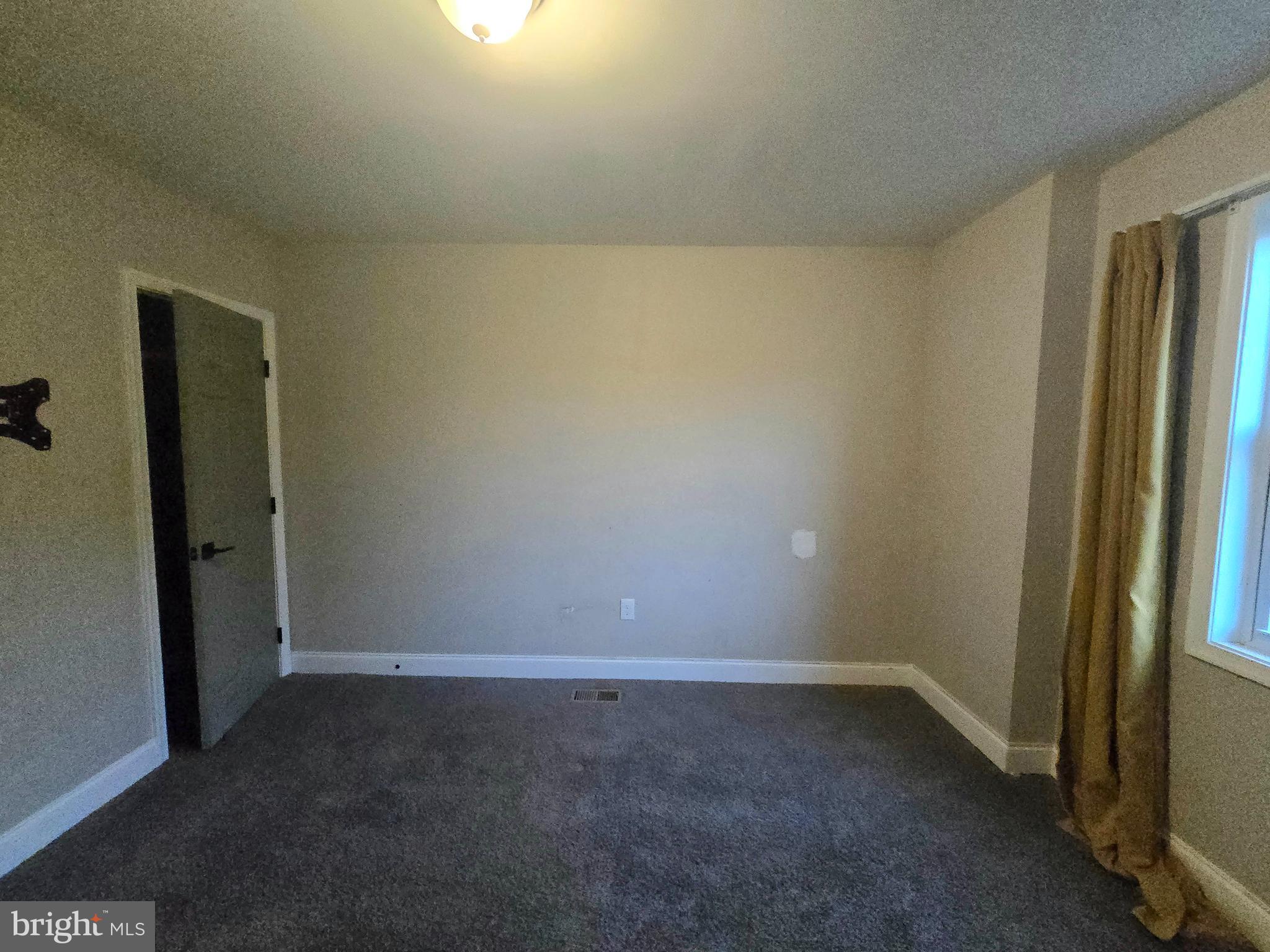 3105 Chelsea Terrace Baltimore, MD 21216 - Photo 47 of 58 a view of an empty room