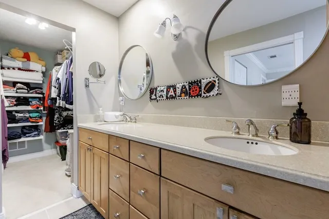 a bathroom with a white bath tub and a shower