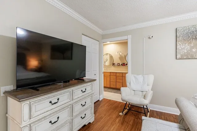 a view of washer and dryer with kitchen in the background
