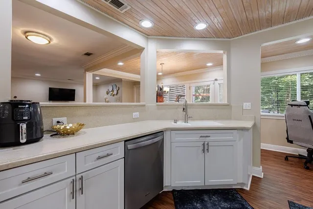 a workspace with furniture and a window