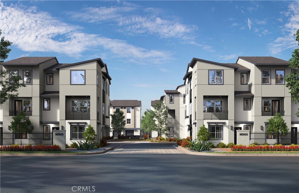 12720 Azure Way, Unit 27 Hawthorne, CA 90250 - Photo 2 of 5 a front view of a residential houses