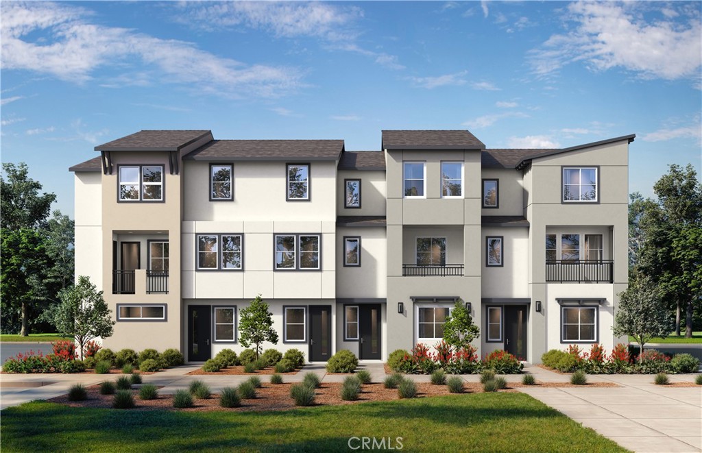 12720 Azure Way, Unit 27 Hawthorne, CA 90250 - Photo 3 of 5 a front view of building with yard