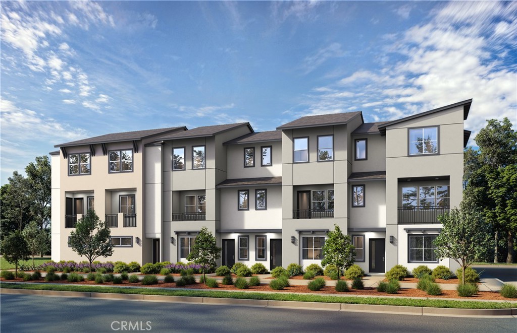 12720 Azure Way, Unit 27 Hawthorne, CA 90250 - Photo 5 of 5 front view of a brick house with a yard