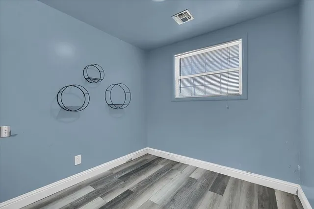 a view of small space with racks on the wall