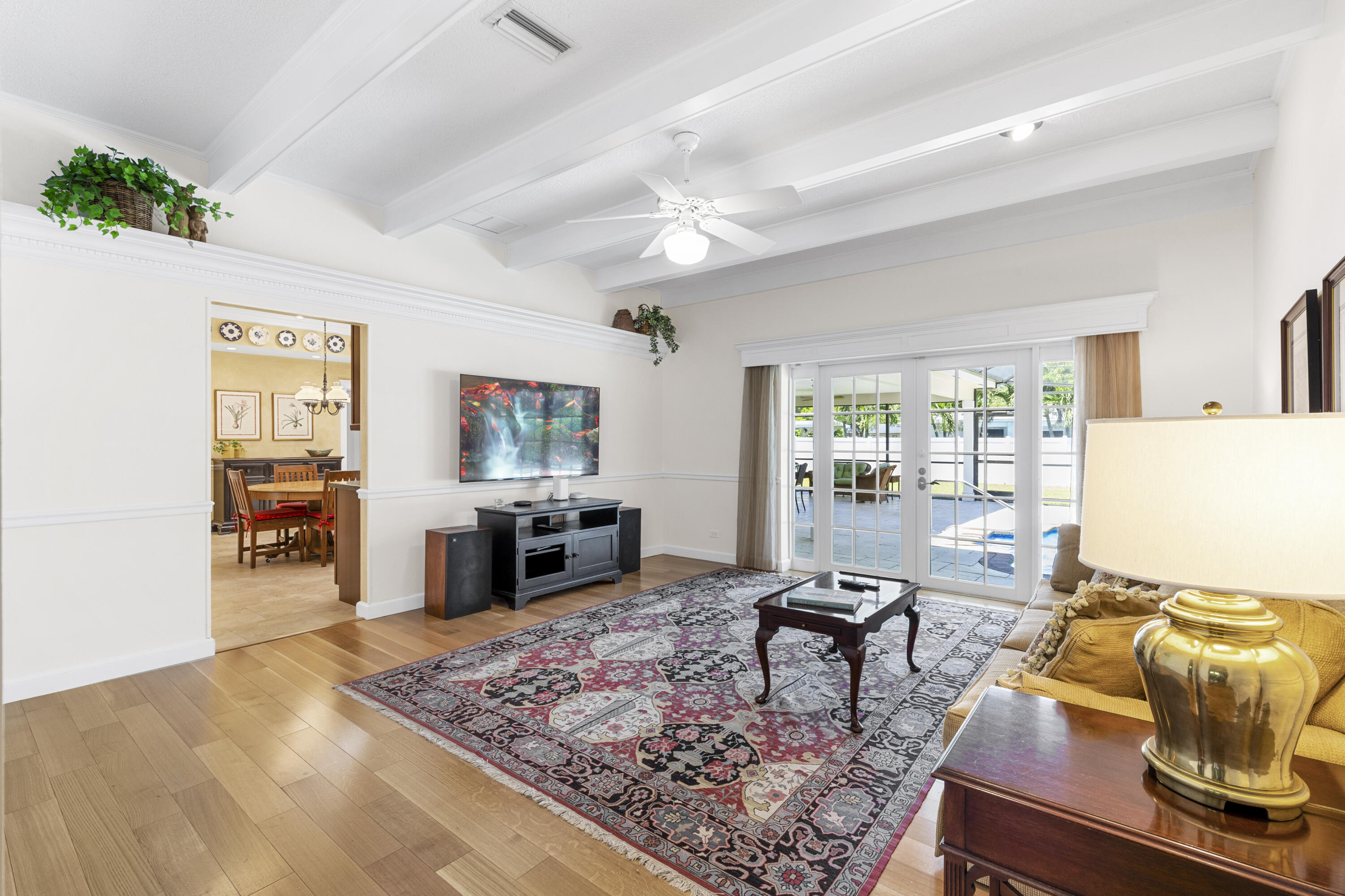 7501 Plantation Road Plantation, FL 33317 - Photo 16 of 57 a living room with furniture and a flat screen tv