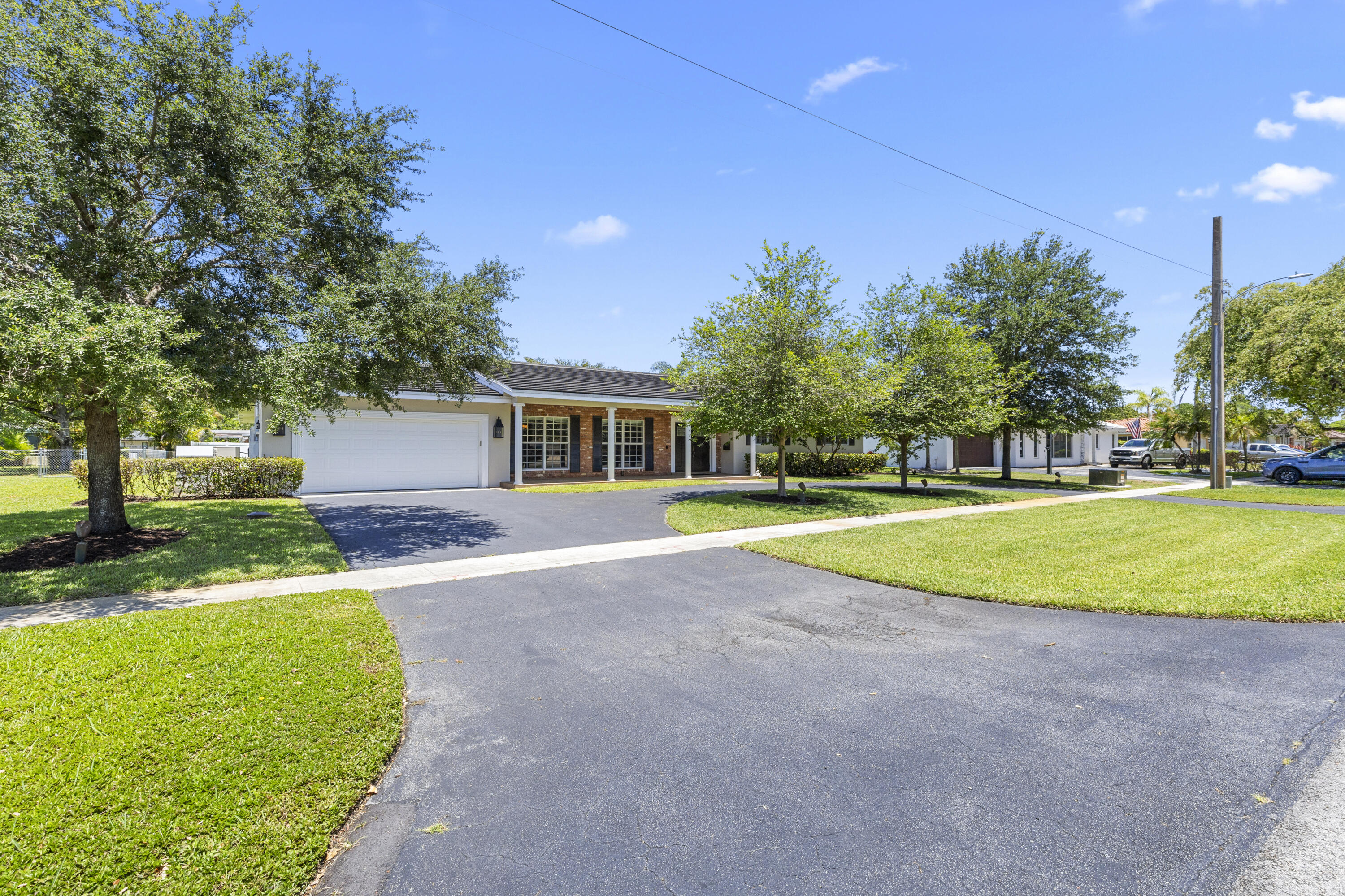 7501 Plantation Road Plantation, FL 33317 - Photo 2 of 57 a view of a house with a yard