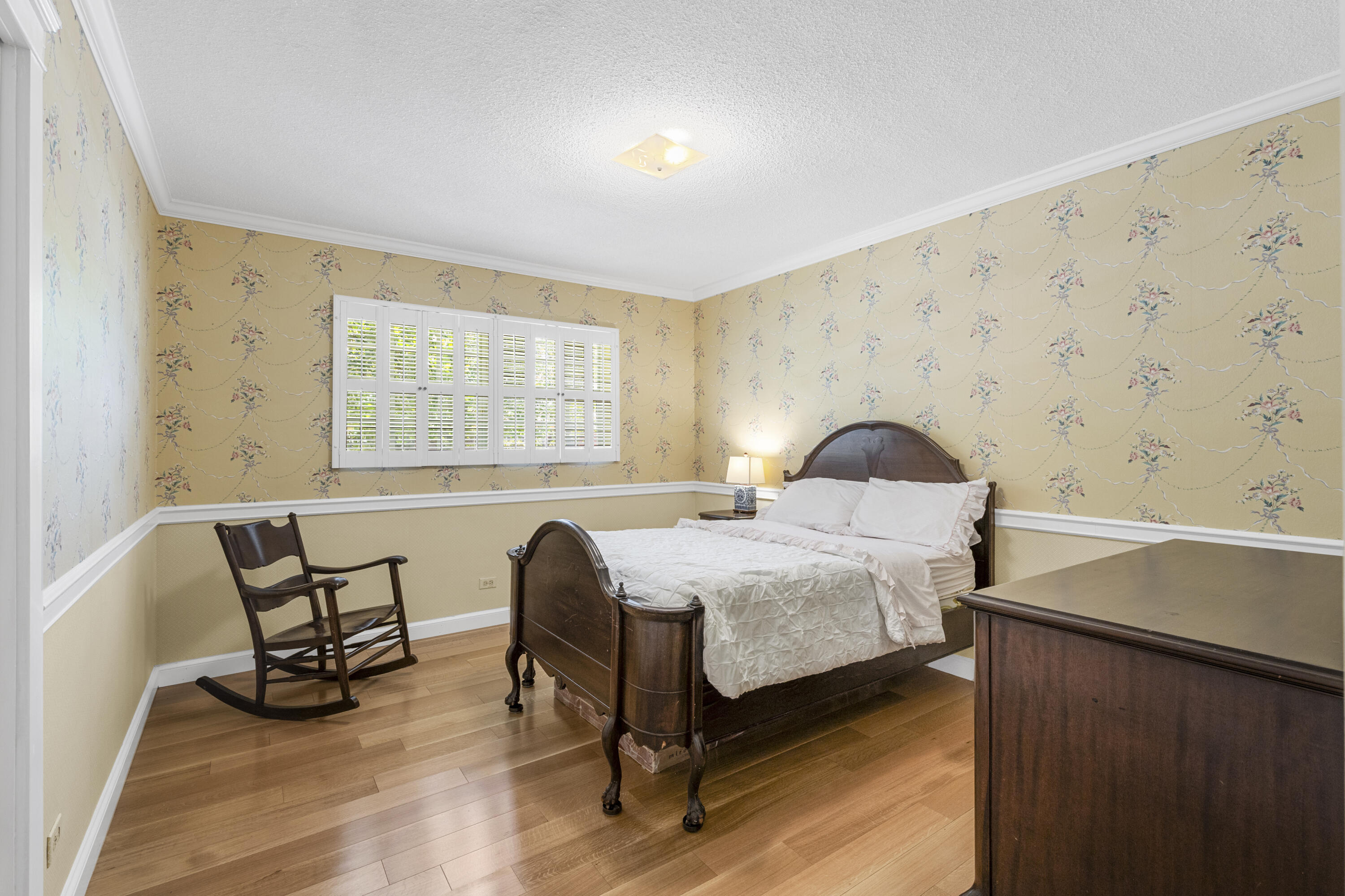 7501 Plantation Road Plantation, FL 33317 - Photo 24 of 57 a bedroom with a bed and a window