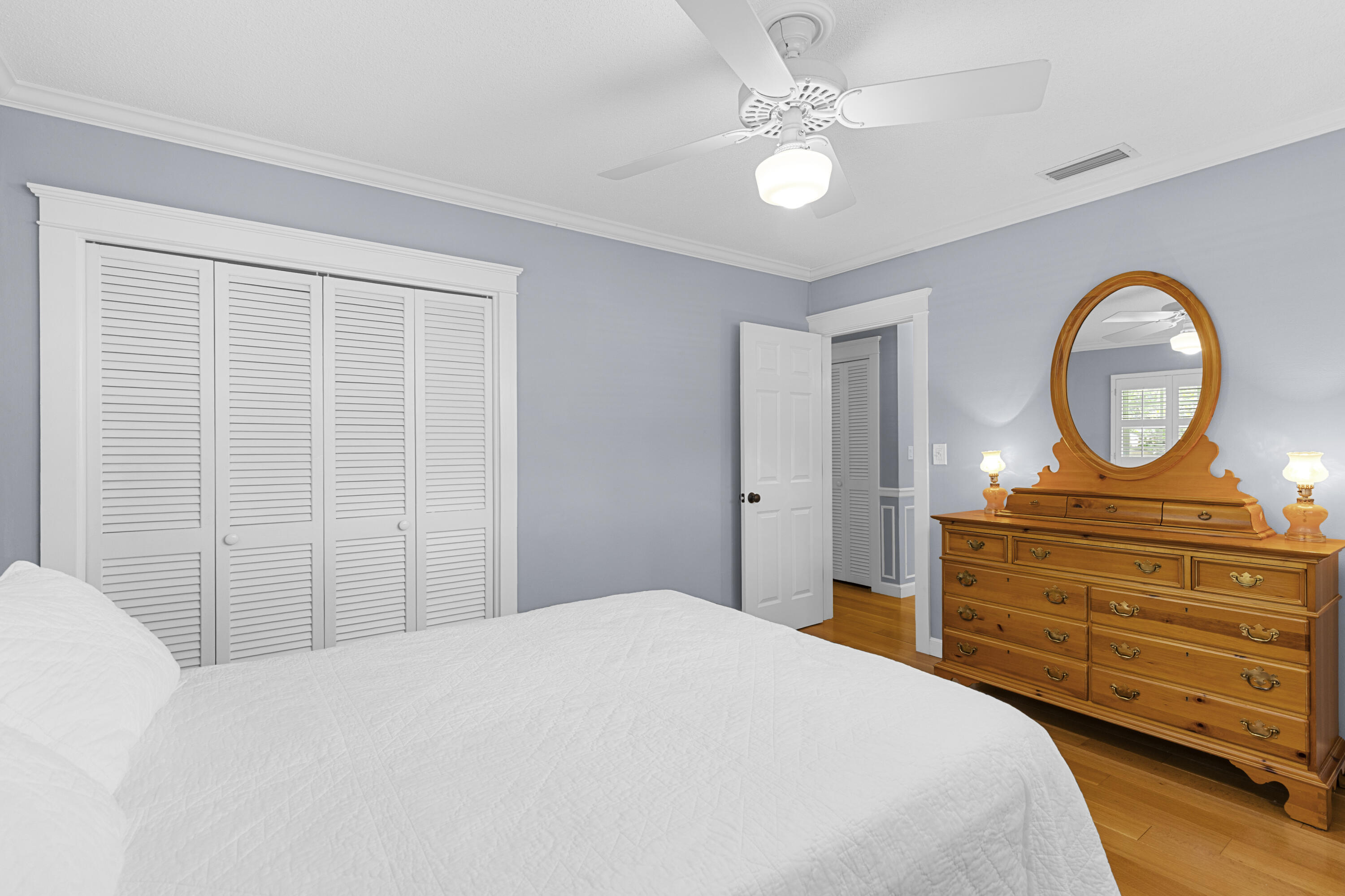 7501 Plantation Road Plantation, FL 33317 - Photo 28 of 57 a bedroom with a bed and a chandelier