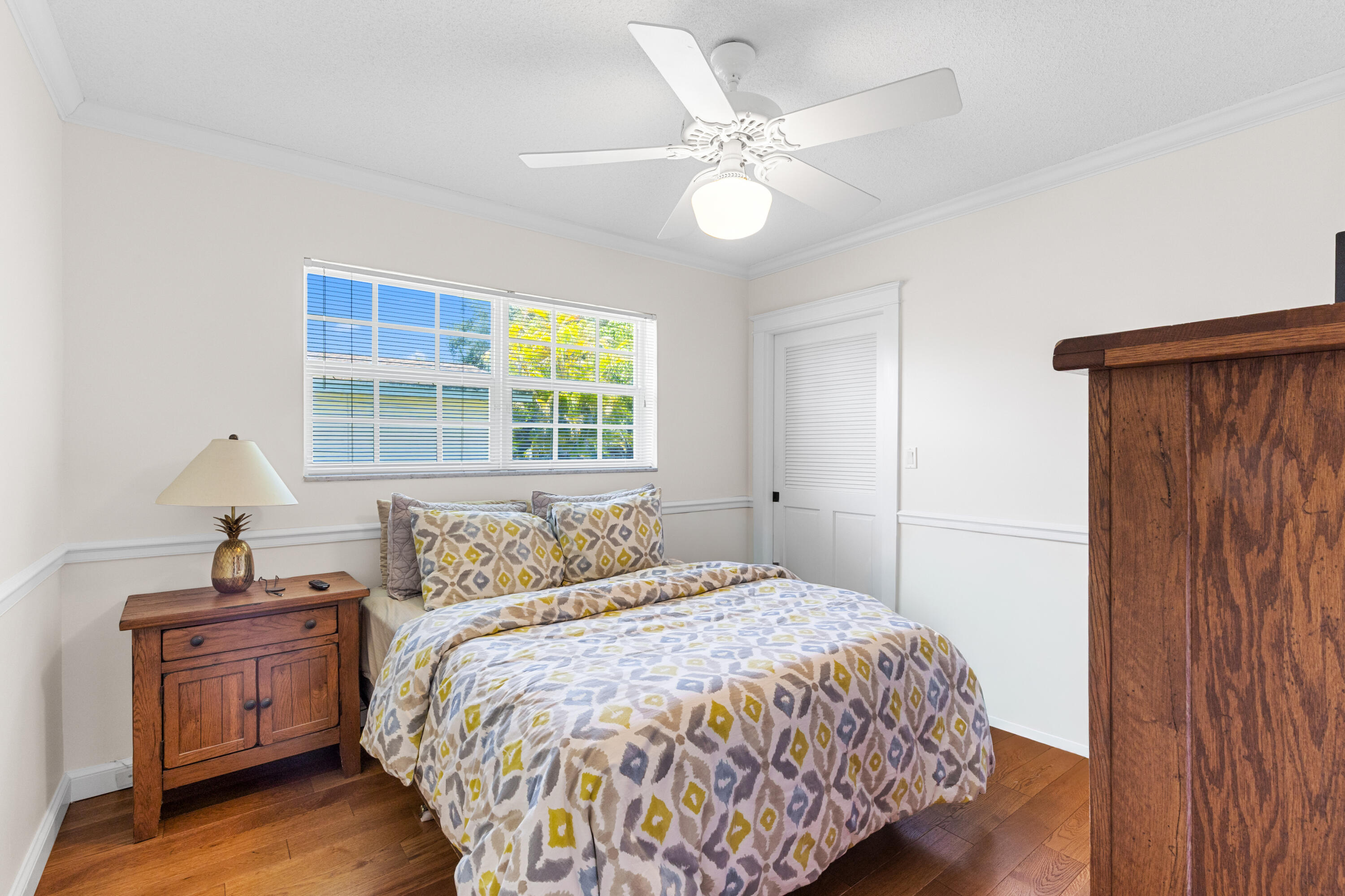 7501 Plantation Road Plantation, FL 33317 - Photo 32 of 57 a bedroom with a bed and a window