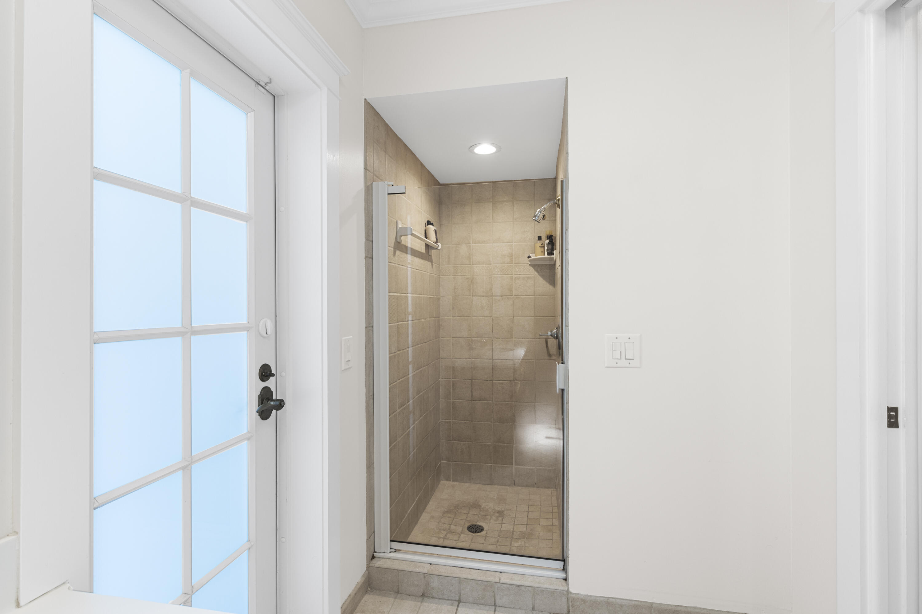 7501 Plantation Road Plantation, FL 33317 - Photo 38 of 57 a bathroom with a glass shower door