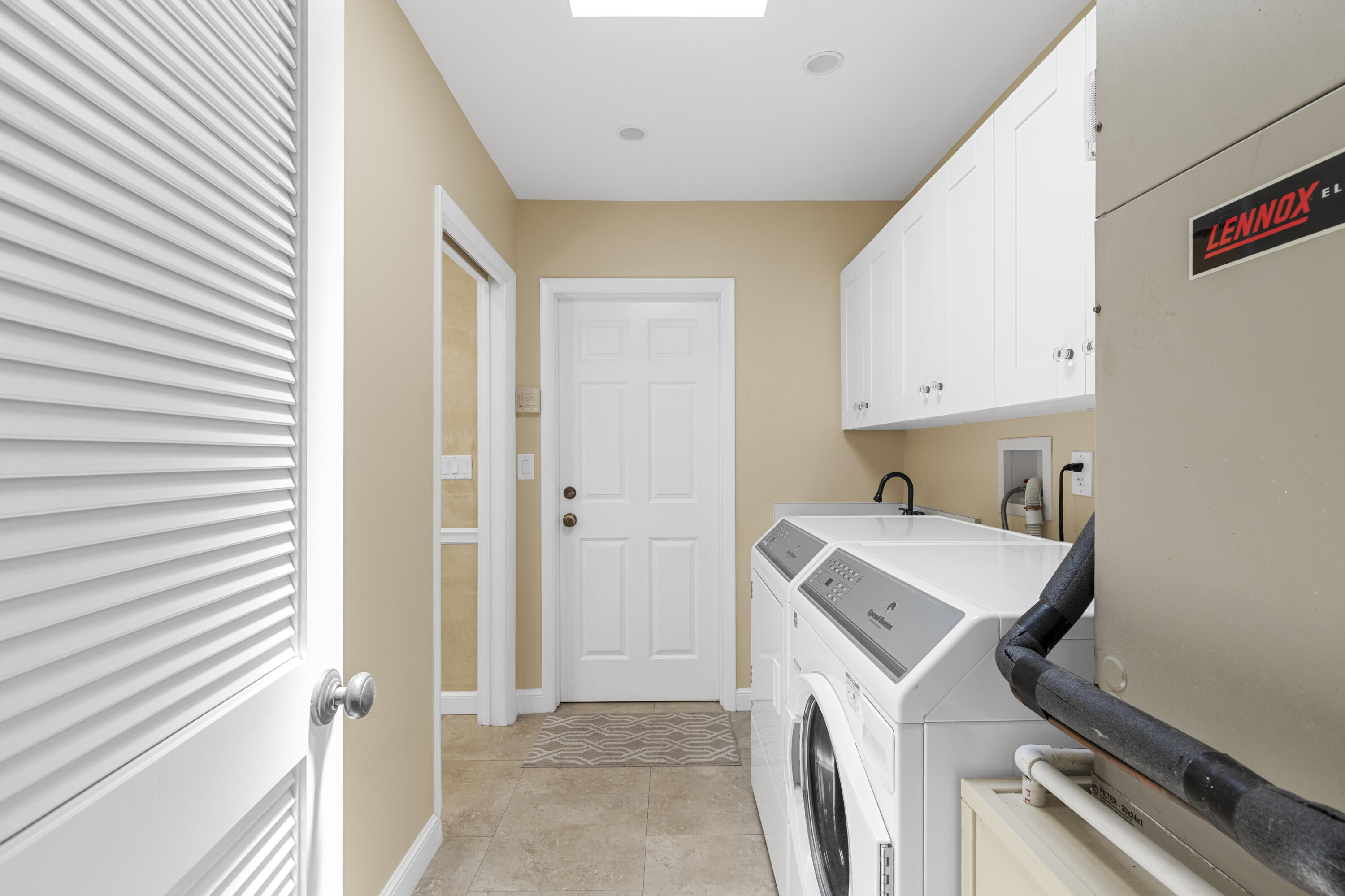 7501 Plantation Road Plantation, FL 33317 - Photo 41 of 57 a utility room with dryer and washer