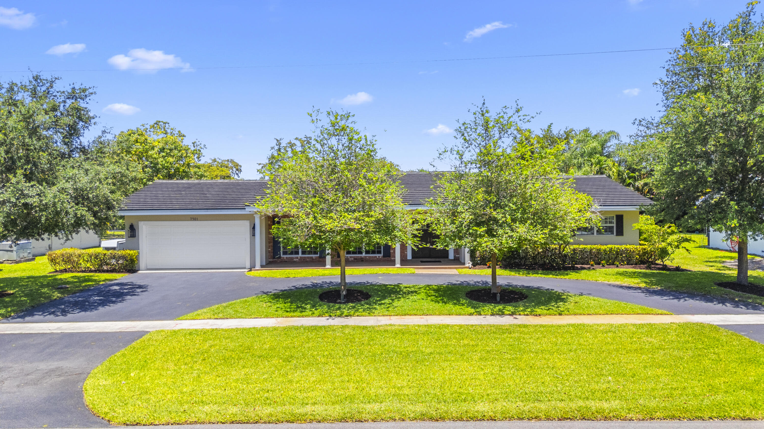 7501 Plantation Road Plantation, FL 33317 - Photo 45 of 57 a swimming pool with outdoor seating and yard