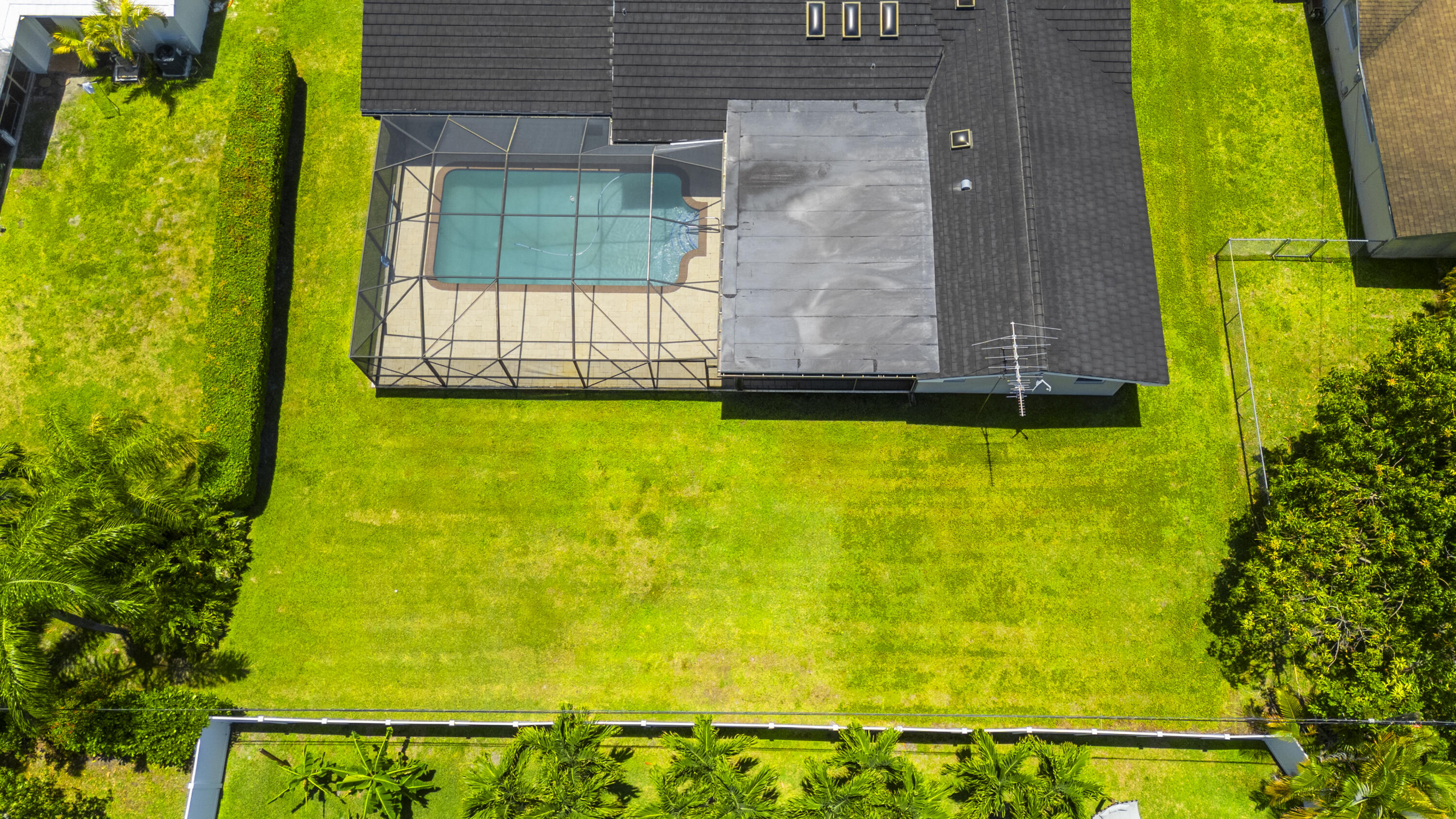 7501 Plantation Road Plantation, FL 33317 - Photo 51 of 57 a view of a swimming pool with an outdoor space