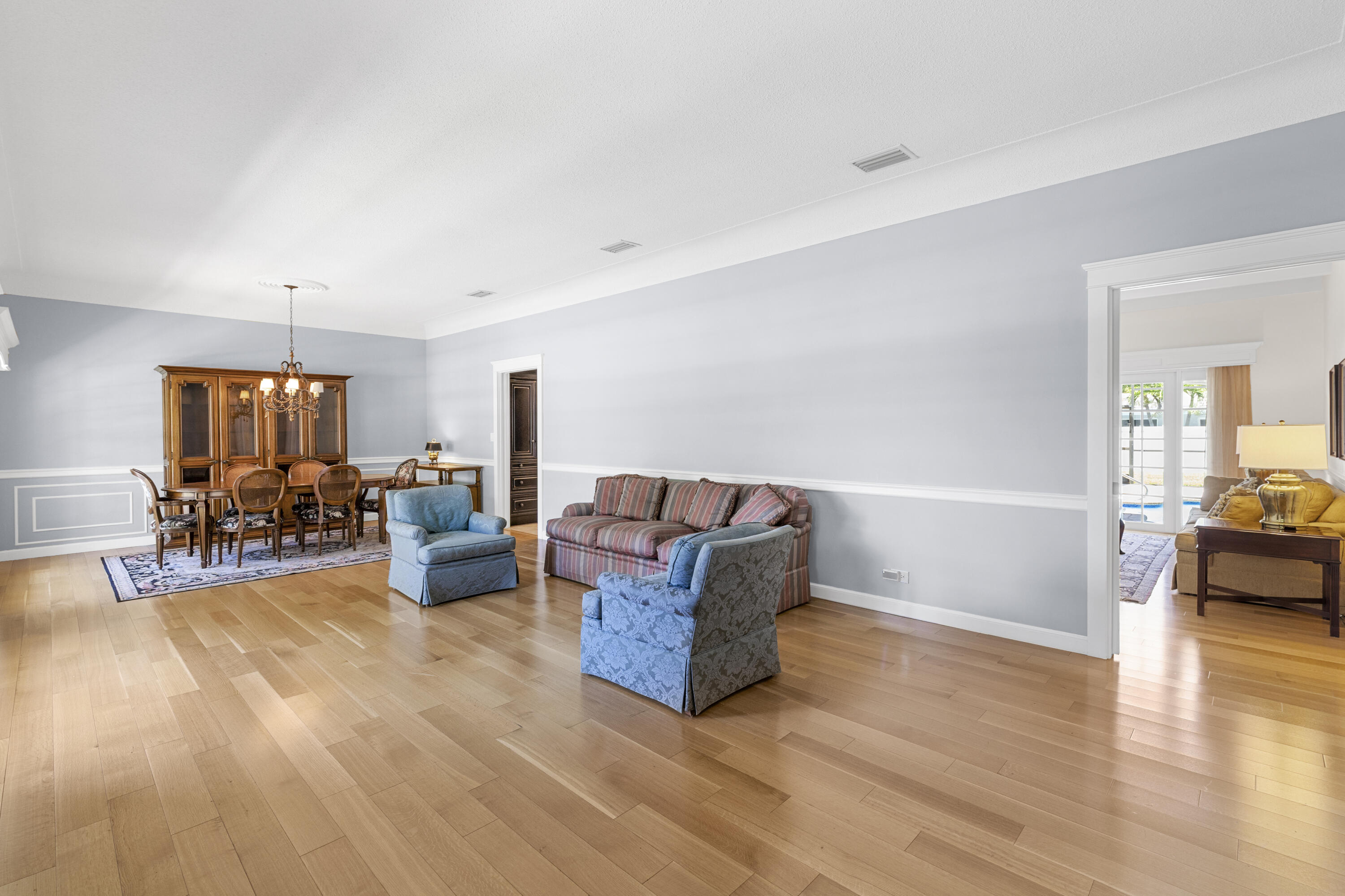 7501 Plantation Road Plantation, FL 33317 - Photo 9 of 57 a living room with furniture and a wooden floor