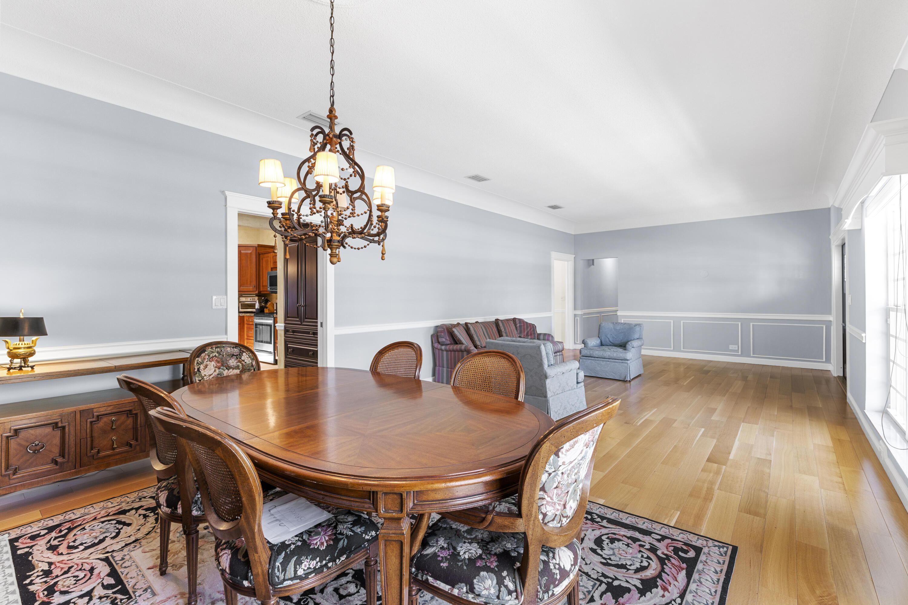 7501 Plantation Road Plantation, FL 33317 - Photo 10 of 57 a dining room with furniture and chandelier
