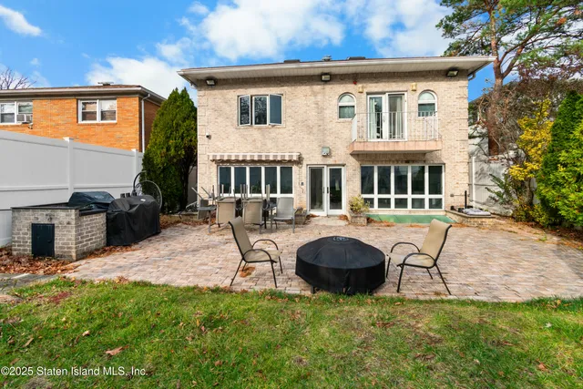 a view of a house with a patio