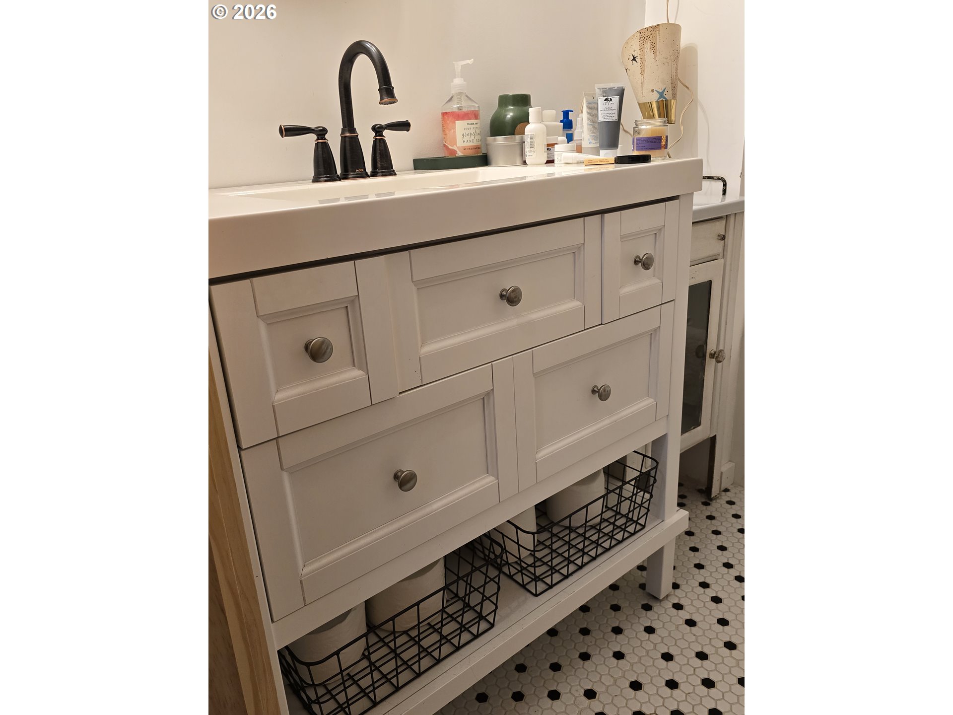 501 Division Avenue, Unit 28 Eugene, OR 97404 - Photo 11 of 17 a close view of a sink and a white cabinets