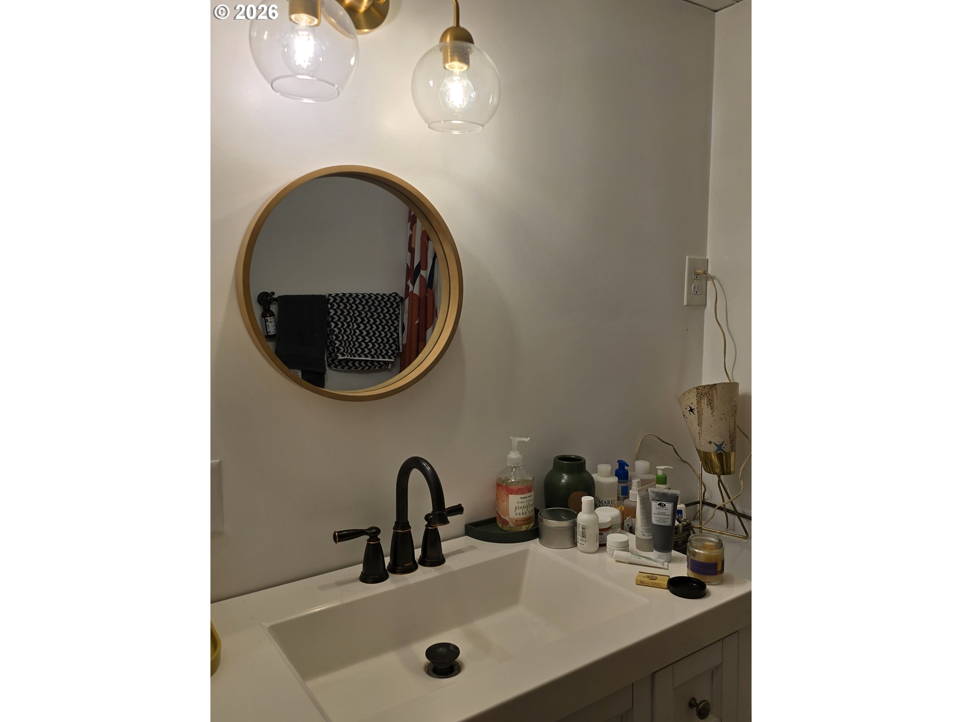 501 Division Avenue, Unit 28 Eugene, OR 97404 - Photo 12 of 17 a bathroom with a sink and a mirror