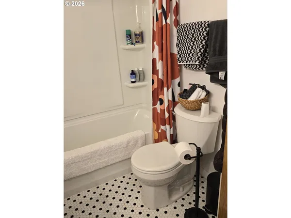 a bathroom with a bathtub