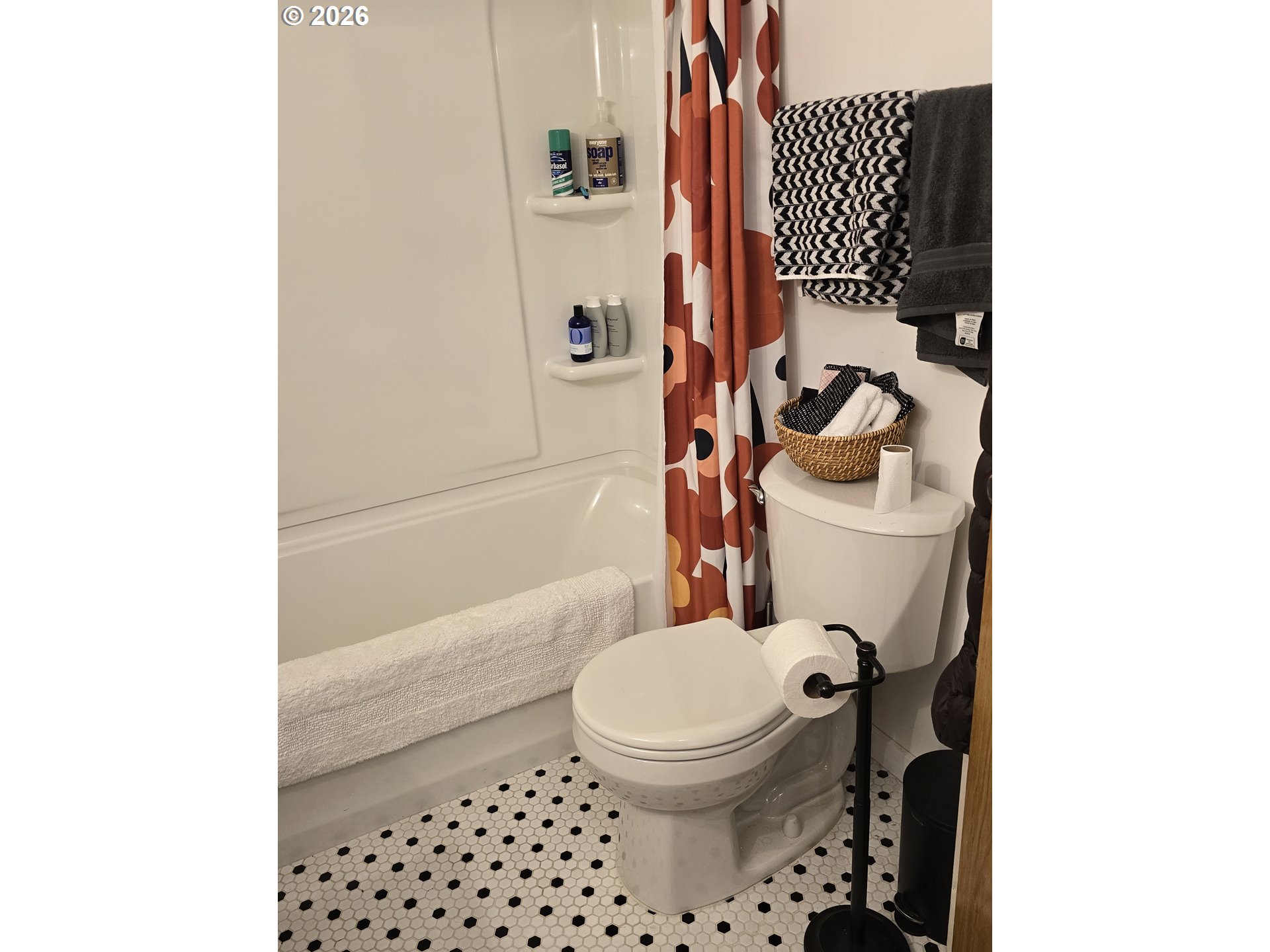 501 Division Avenue, Unit 28 Eugene, OR 97404 - Photo 13 of 17 a bathroom with a toilet and a shower