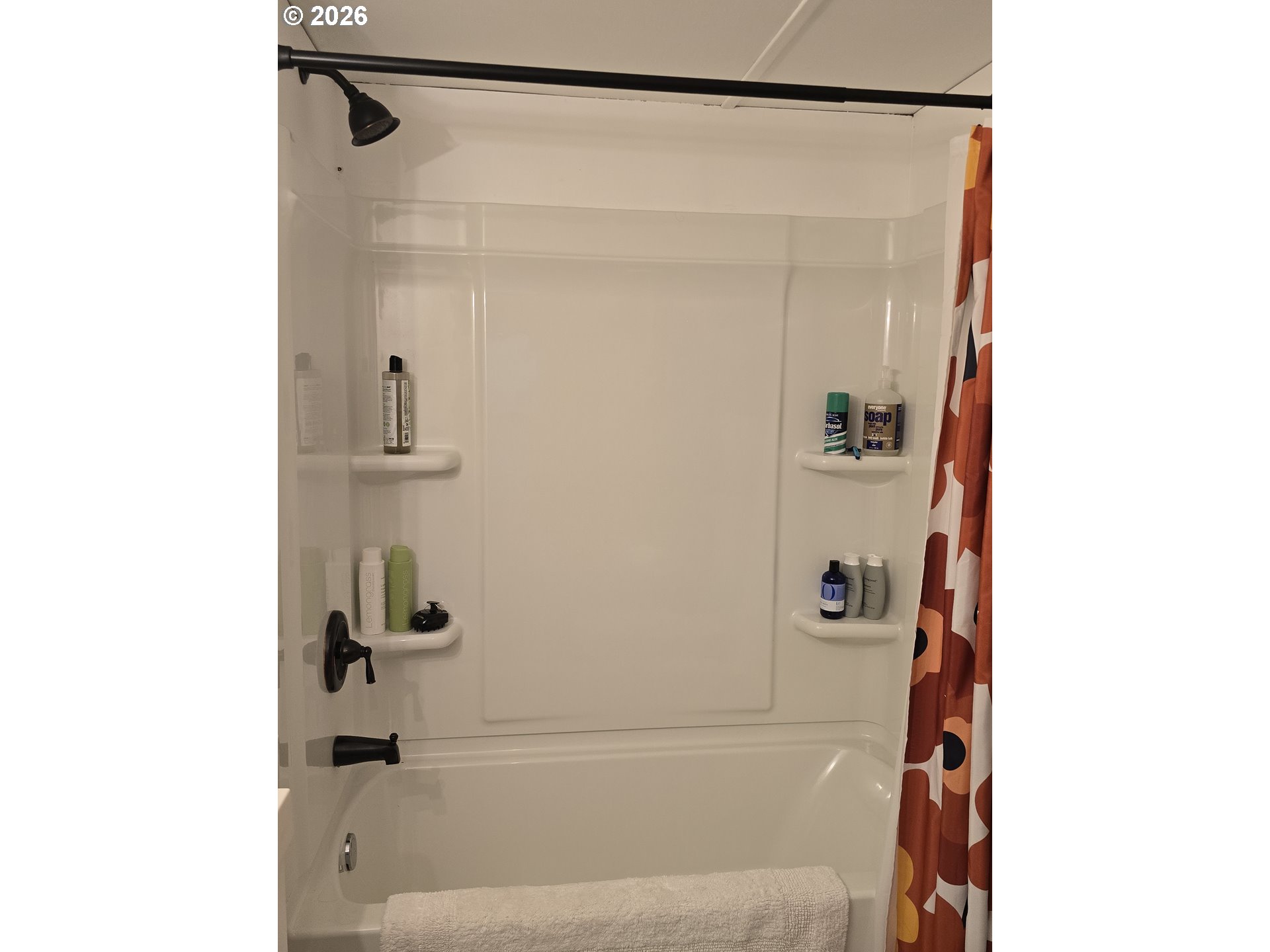 501 Division Avenue, Unit 28 Eugene, OR 97404 - Photo 14 of 17 a bathroom with a bathtub