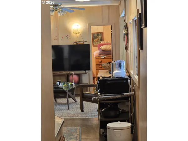 a close view of a sink and a white cabinets