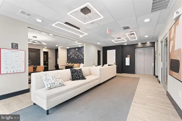 a living room with furniture and a couch